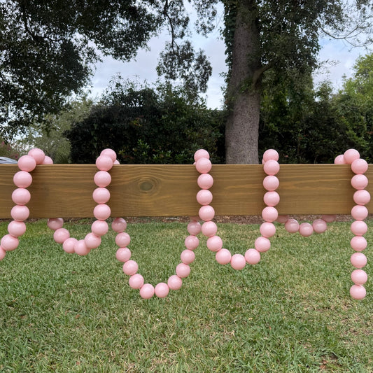 giant string of light up Pearls soft pink daytime pick