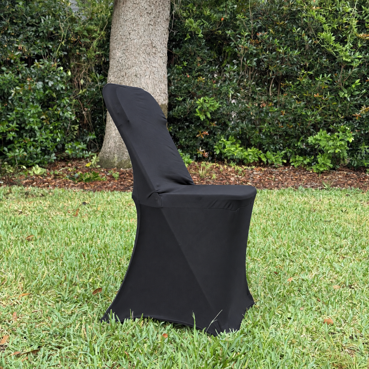 Black spandex, folding chair, cover side view facing right