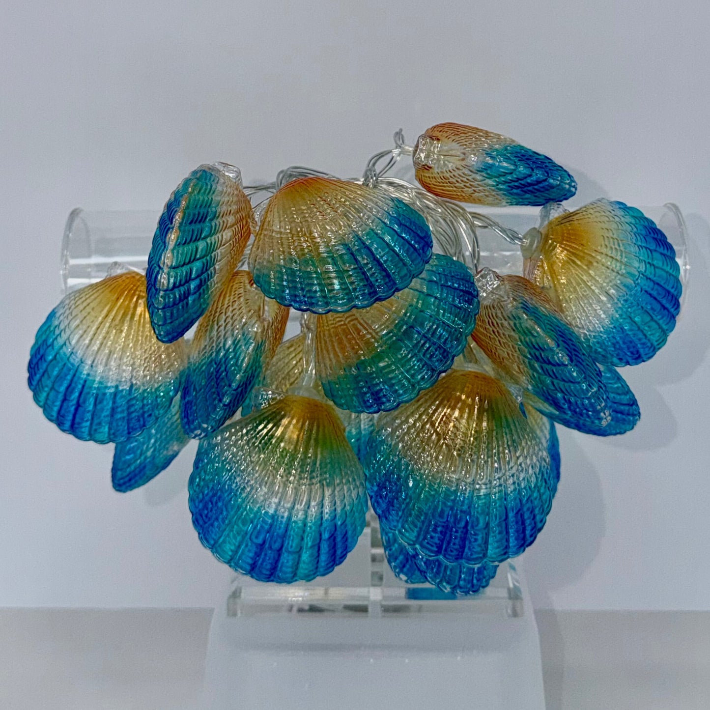 String of Blue Scallop Shell Lights - iridescent blue and gold shells lit up