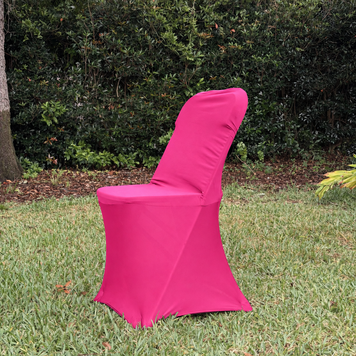 Pink spandex, folding chair cover facing left