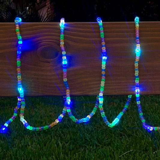 Beaded string of lights glow in the dark cosmic Blue