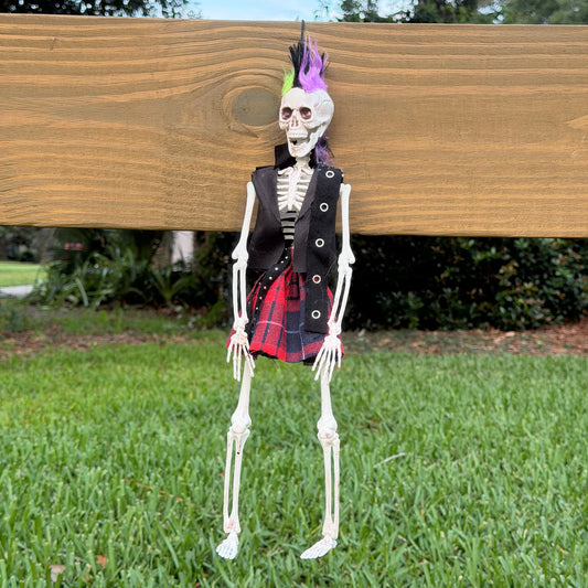 Punk rock, rockstar skeleton in kilt