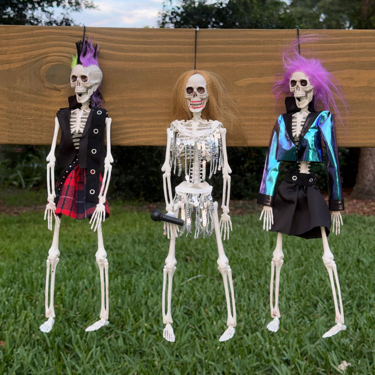 Punk rock, rockstar skeletons in kilts girl, singer skeleton with microphone