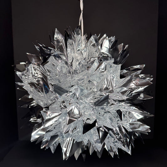 Reflective, silver pom-pom 