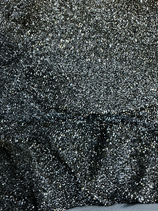 Actual black metallic shimmer chair cover fabric texture close-up