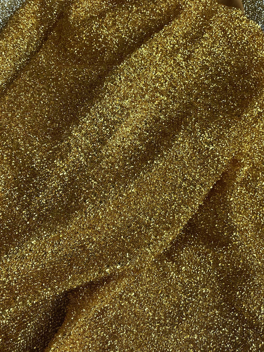 Actual gold metallic shimmer chair cover fabric texture close-up
