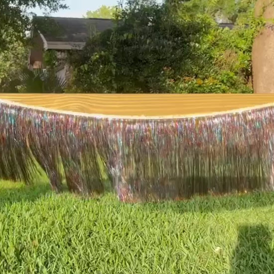 Video clip of the multicolor bougie fringe in movie metallic tinsel fringe 4 feet long 12 foot drop