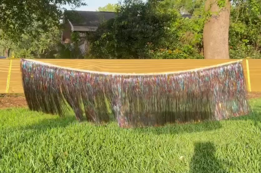 Video clip of the multicolor bougie fringe in movie metallic tinsel fringe 4 feet long 12 foot drop