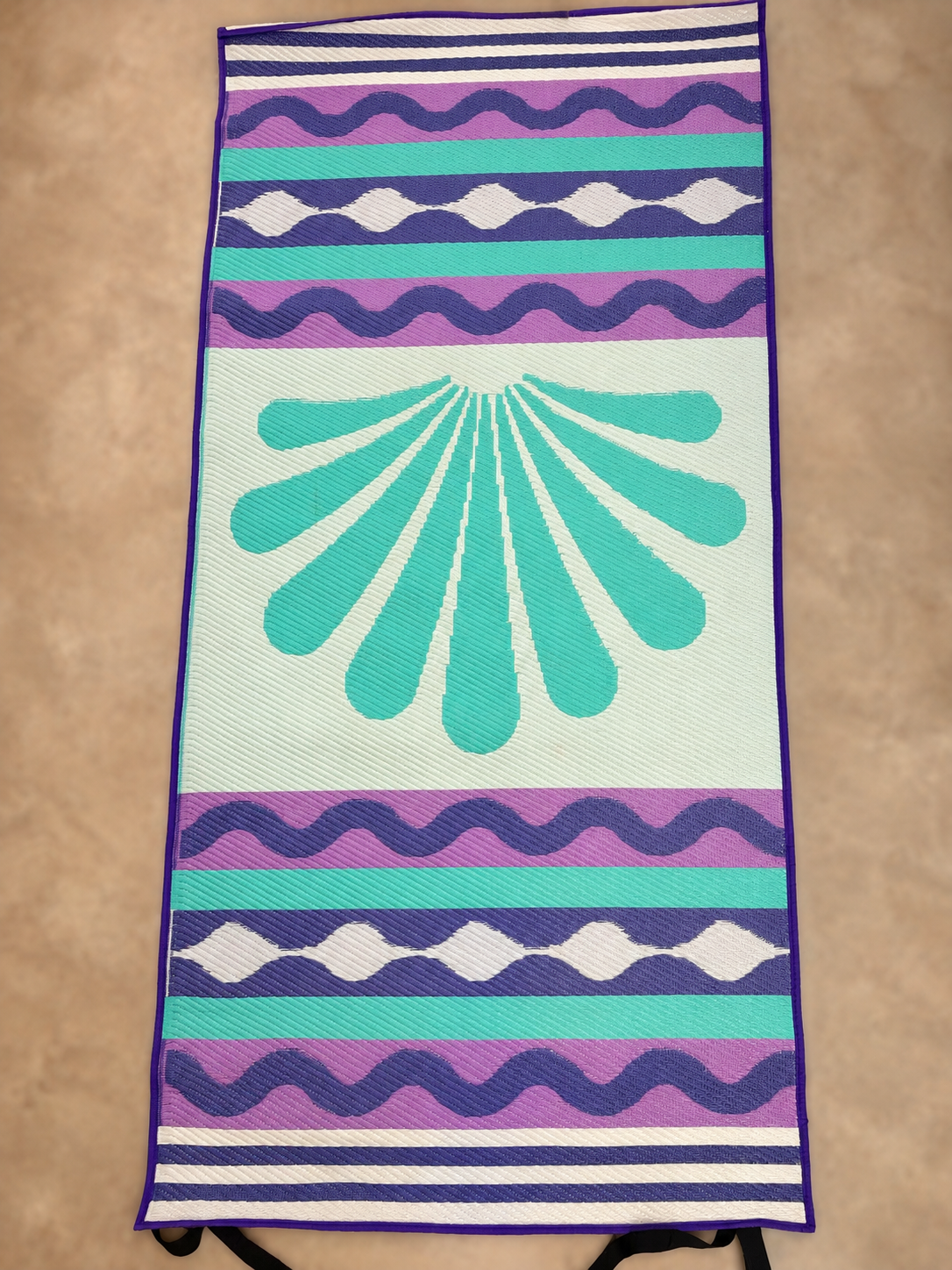 Cream reverse of same rug with turquoise radial design and purple stripes